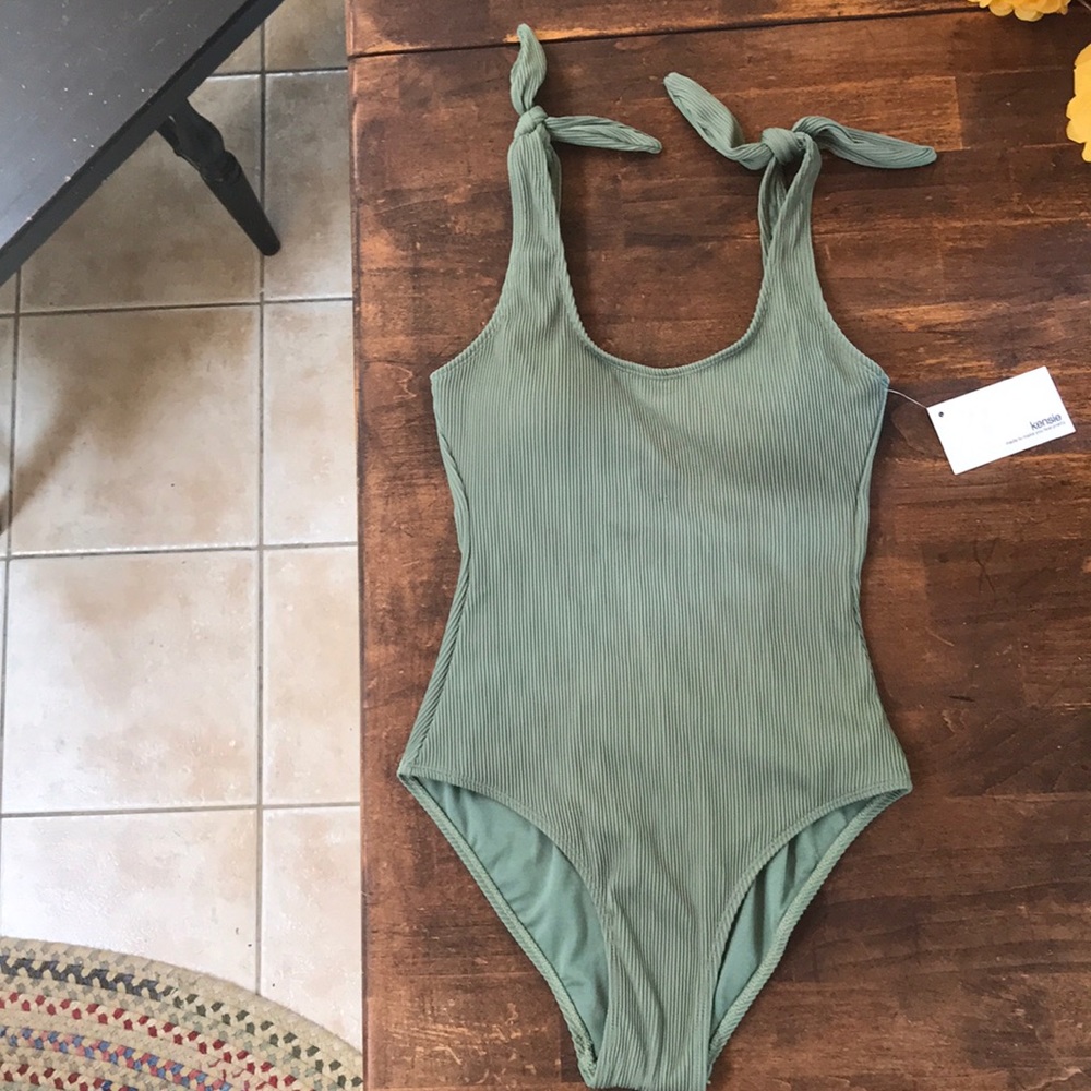 Woman’s one piece swim suit.